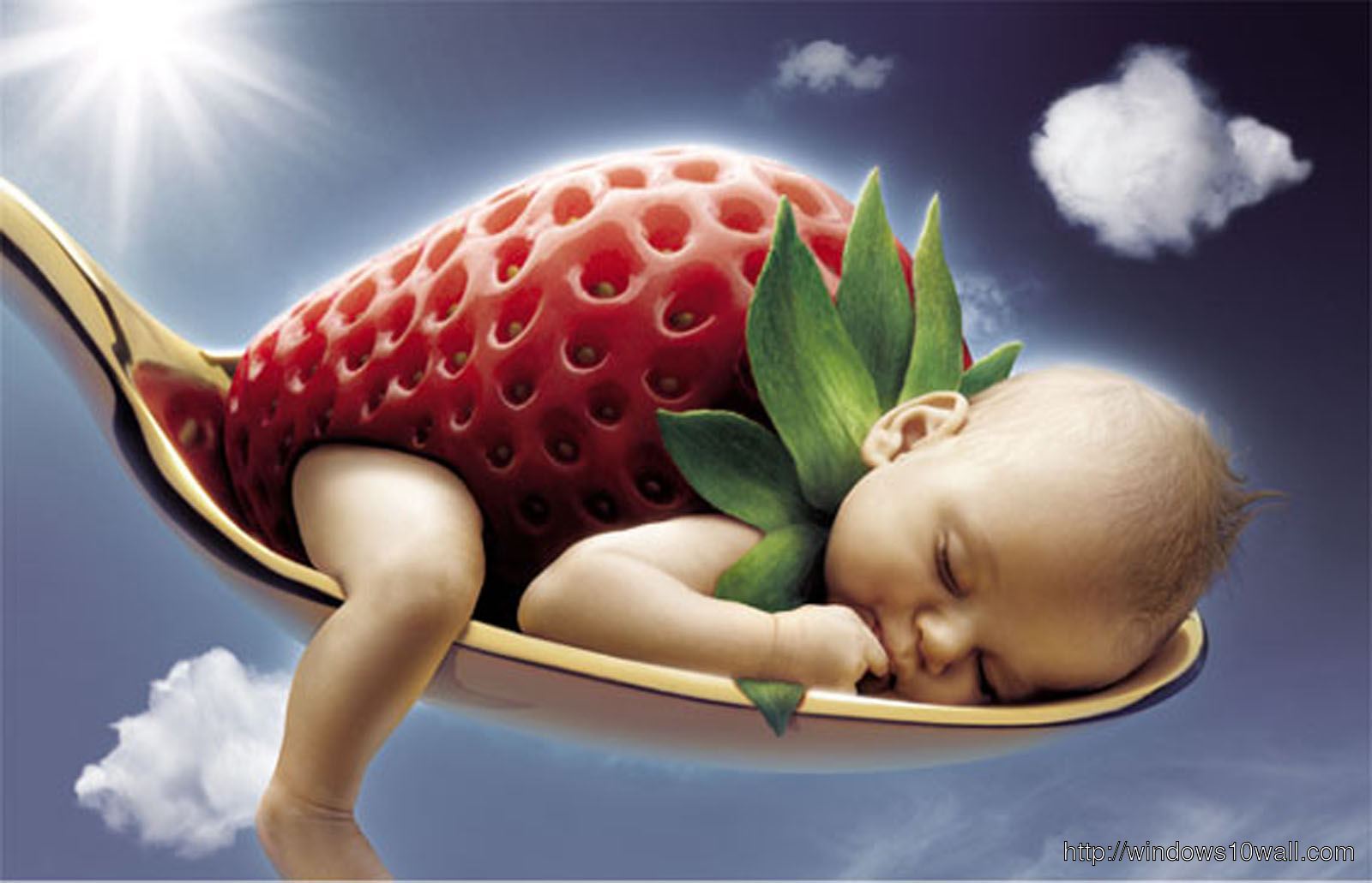 Sweet Baby Picture with Strawberry on Spoon Wallpaper