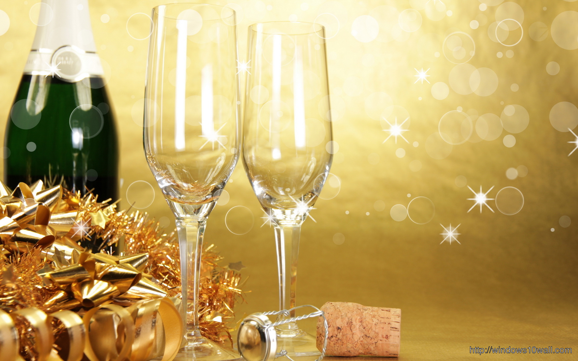 Champagne Glasses on Golden Background Wallpaper