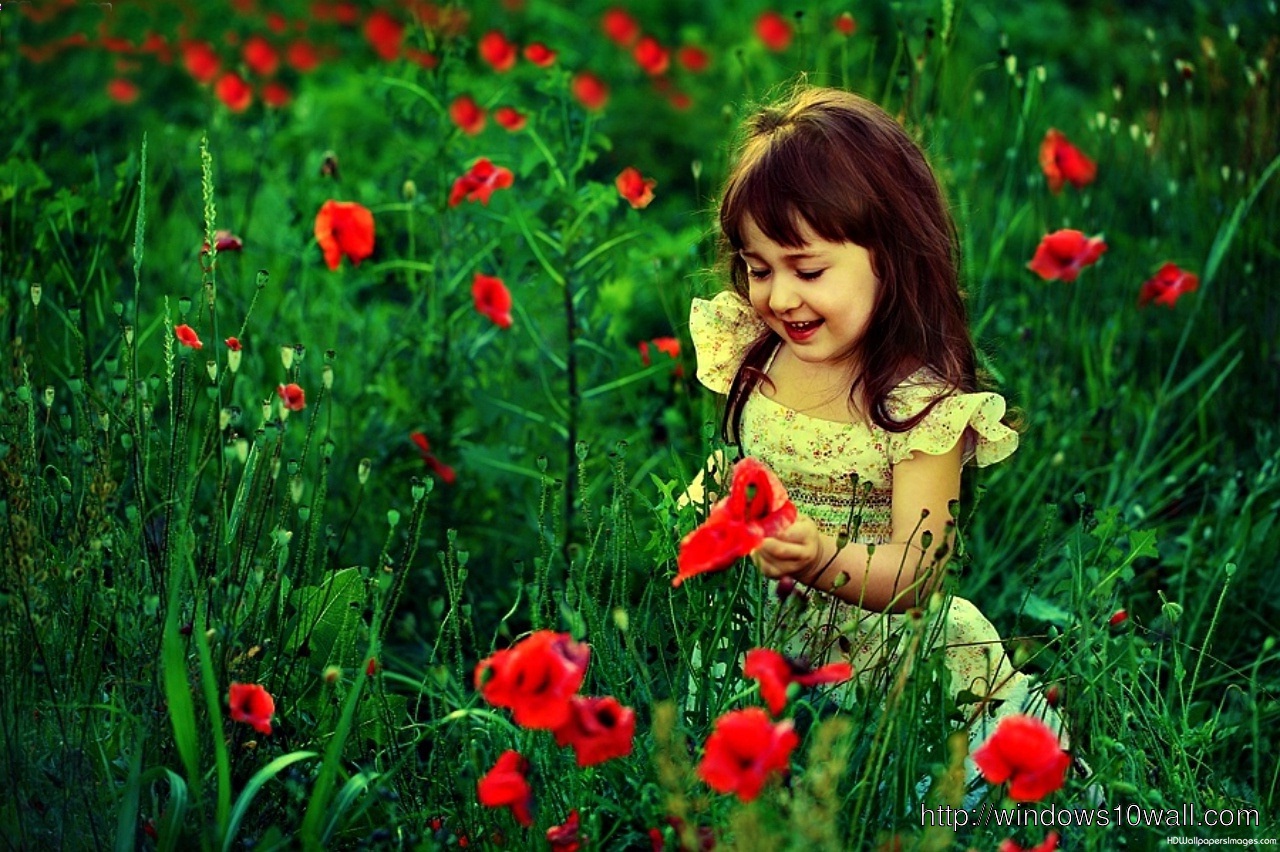 Beautiful Baby Girl in Green Nature Red Flowers