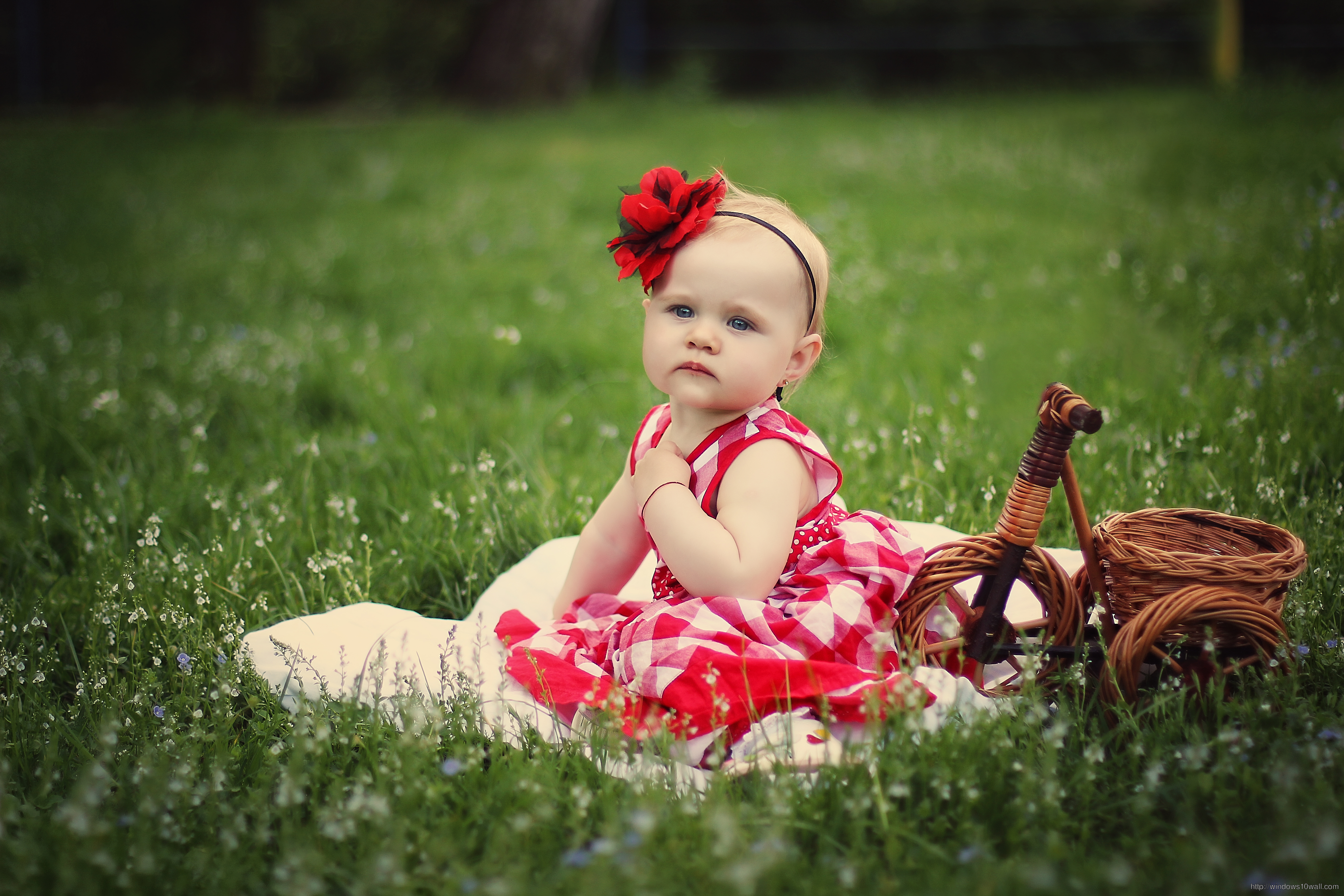 Cute Baby Girl In Field Wallpaper