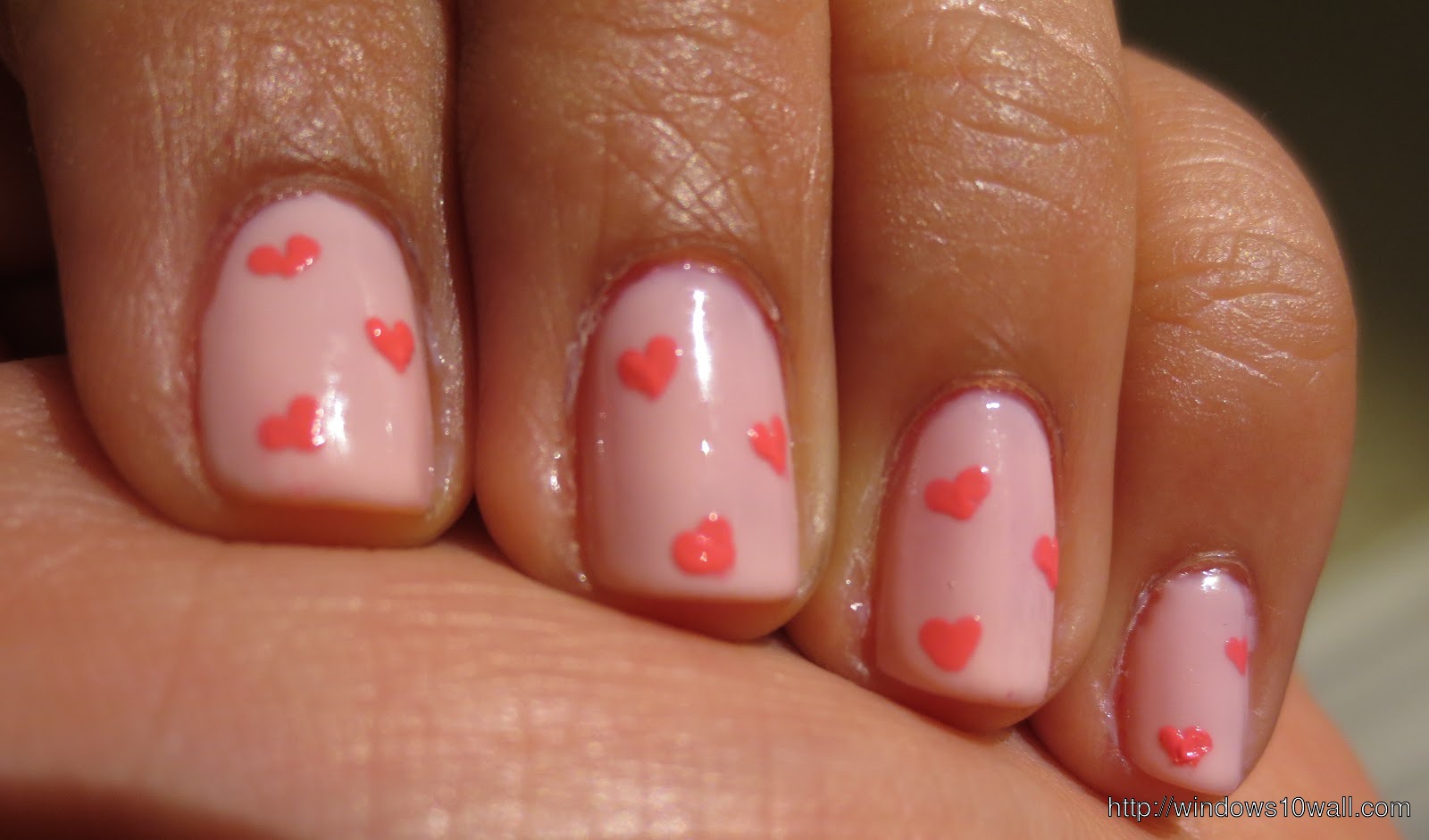 beautiful-pink-nail-art-with-hearts-background-wallpaper